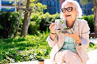 Lady enjoys salad
