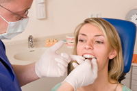 Patient in Collierville talking to dentist about Invisalign