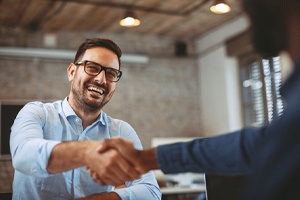 smiling person at a job interview