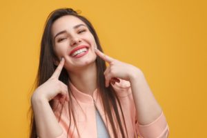 Woman smiling.