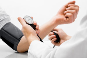 Patient having blood pressure taken