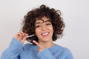 woman wearing Invisalign