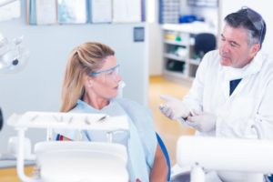 dentist speaking with a patient