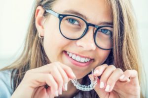 Woman with Invisalign in Collierville