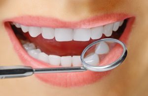 Gum disease is an oral health threat leading to tooth loss and systemic health issues. Dr. Joshua Holcomb tells patients the signs of this serious condition.