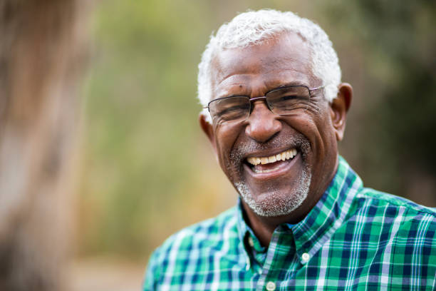 person with dentures smiling 